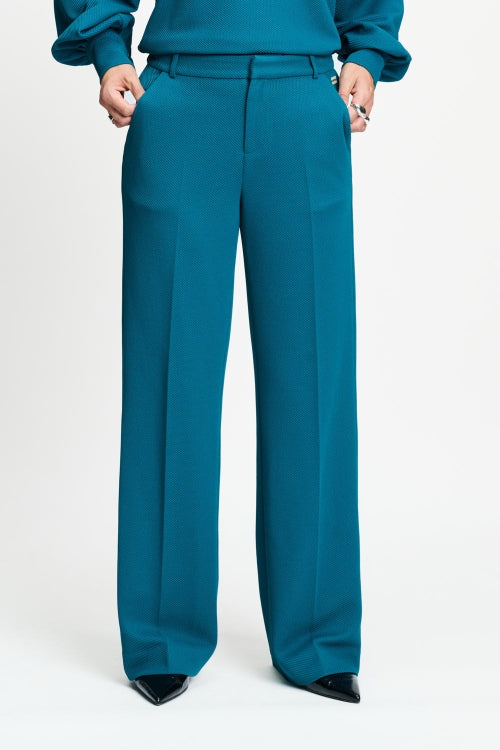 Pom lara teal green